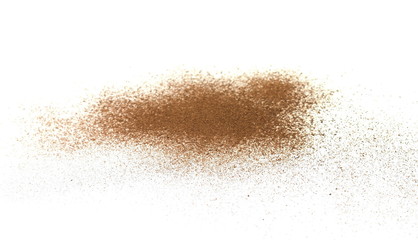 Plakat Spice cinnamon powder isolated on a white background. Cinnamon powder spilled on a white surface.
