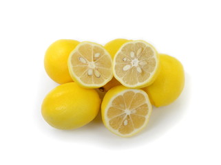 Naklejka na ściany i meble Heap of lemon. Juicy yellow slice of lemon on a white background isolated. Cut lemon fruits isolated on white background.