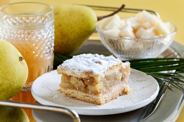 Homemade fruit cake and drinks on the table.