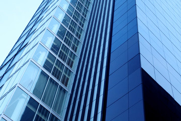 Fototapeta na wymiar Modern office building on a background of the blue sky