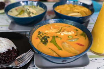 Thailand traditional food: colorful curry and rice for a normal lunch