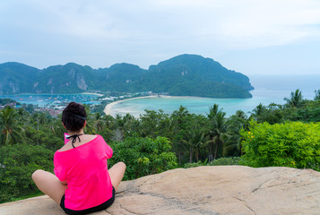 young cute hipster girl travelling at beautiful blue sky paradise tropical  coast beach PP Island Krabi Phuket Thailand guiding idea for long weekend  female relax rest woman women planning life