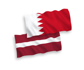 Flags of Latvia and Bahrain on a white background