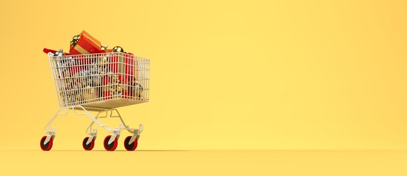 Shopping cart with christmas gift yellow background