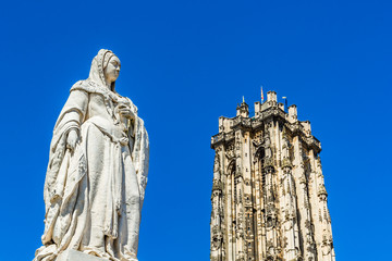 Statue of Archduchess Margaret of Austria and the tower of Saint Rumbold's Cathedral in Mechelen, Belgium - obrazy, fototapety, plakaty