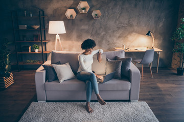 High angle view photo of amazing dark skin curly lady browsing notebook texting with friends...