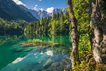 Spring landscape at Lake Fusine on the slopes of the Julian Alps, Tarvisio, Italy