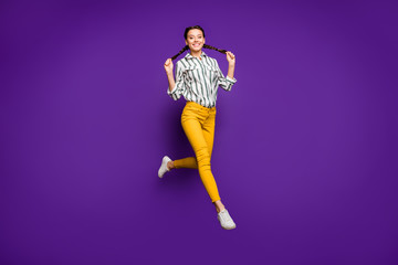 Fototapeta na wymiar Full length body size view of her she nice attractive lovely charming cheerful cheery girl jumping walking having fun isolated over bright vivid shine vibrant violet purple lilac color background