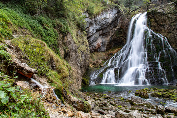 Fototapeta na wymiar Impressive Golling Waterfall cascading into turquoise pool