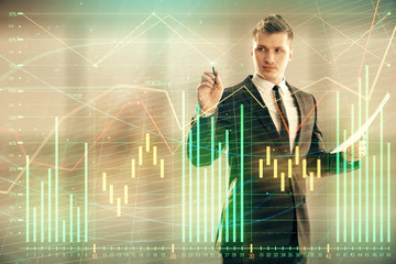 Businessman and forex graph hologram. Double exposure. Concept of financial education and analysis