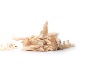Wood shavings, beautifully curled in to a spiral isolated on white