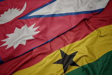 waving colorful flag of ghana and national flag of nepal.