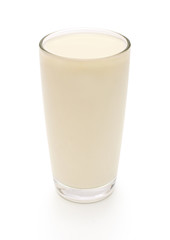 Glass of milk isolated on white background. Coconut oil. Organic product