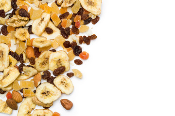 top view of dried fruits scattered on white background with copy space