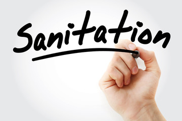 Hand writing Sanitation with marker