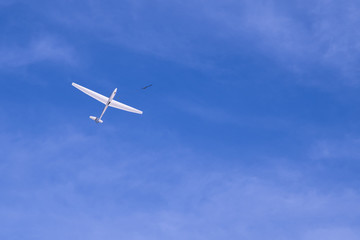 Fototapeta na wymiar Glider plane take off - towed takeoff by winch