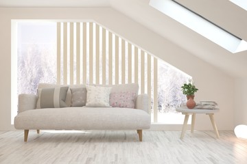 Fototapeta premium Stylish room in white color with sofa and winter landscape in window. Scandinavian interior design. 3D illustration