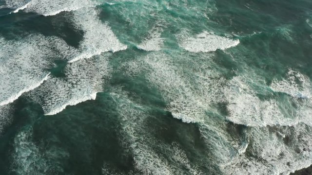Turquoise ocean waves aerial background view
