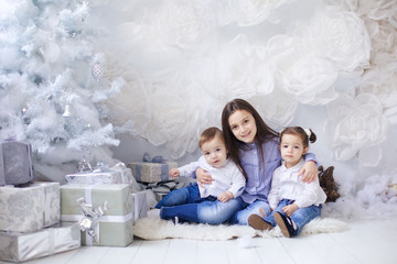 Beautiful children sitting in a room