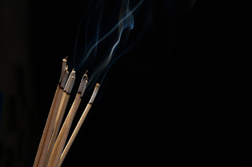 Naklejka premium Incense and smoke