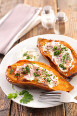 baked sweet potato with cream and herbs