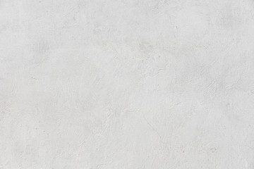 Rough white relief stucco wall texture background. blank for designers