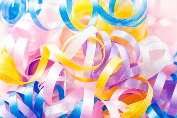Multi-colored party streamers close up. Holidays clebrate concept