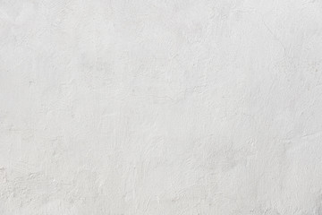 Rough white relief stucco wall texture background. blank for designers