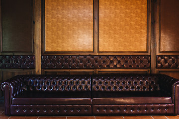 Photo of business interior in the office.  brown sofa
