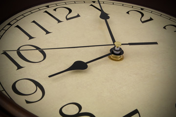 Time passing concept, old clock close up