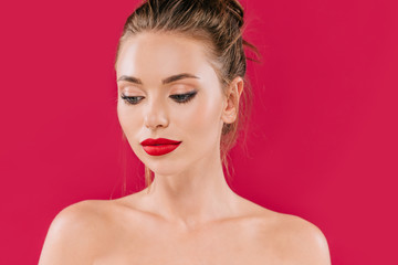 Fototapeta premium naked beautiful woman with red lips looking away isolated on red
