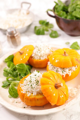 pumpkin filled with rice and salad