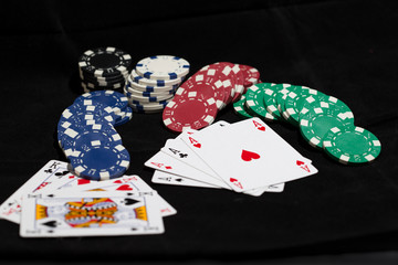 Poker cards with betting chips.