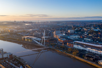 An aerial view at sunrise of Newport city centre, south wales United Kingdom, taken from the River Usk