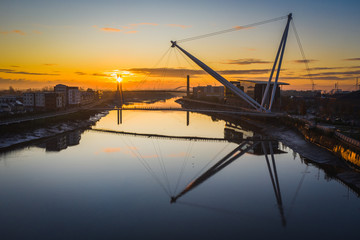 An aerial view at sunrise of Newport city centre, south wales United Kingdom, taken from the River...