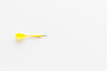 Plastic dart or arrows for darts game on white background top view copy space