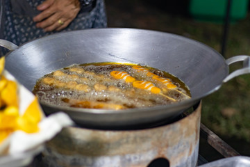 Shop selling fried meatballs at the festival at night