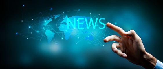 businessman searches the internet for news in the world