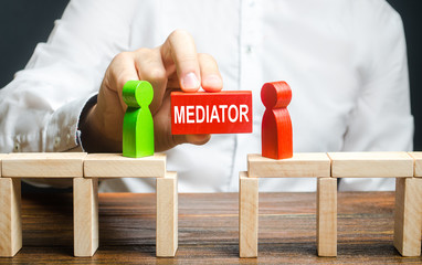 A man makes contact between people opponents. Arbitrator and mediator. Build bridges, seek a...