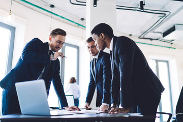 Multiracial businessman sharing ideas about project