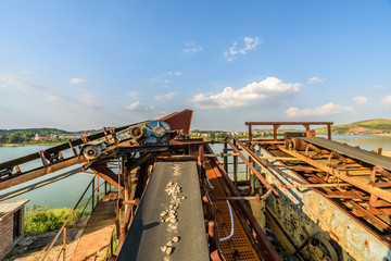 Large equipment and gravel belts on the quarry 