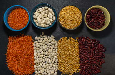  healthy eating vegetarian beans lentils and peas on a dark background