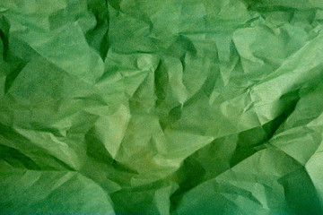 Fototapeta na wymiar Old crumpled green paper texture