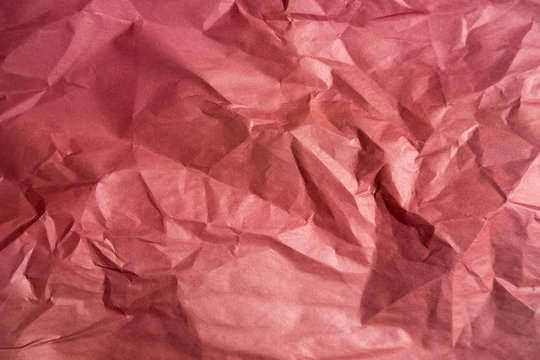 Old crumpled red paper texture