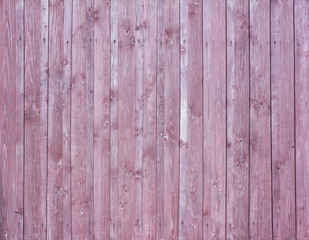 Dark wood background, wood texture.Wooden fence covered with stain.