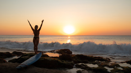 silhouette of woman on the beach