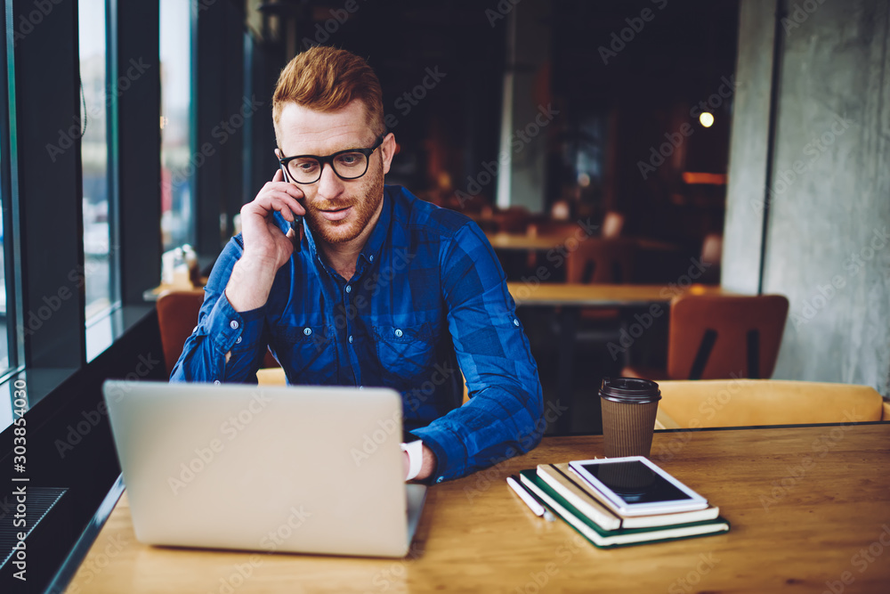 Poster caucasian man calling to provider operator and discussing notification about 4g connection on laptop