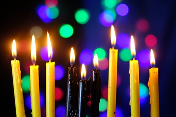 The lit of hanukkah candles Hanukkah candles on bokeh background