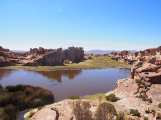 Fototapeta na wymiar Laguna Misteriosa, Mysterious lake in the midst of beautiful sky and nature, Journey from San Pedro de Atacama in Chile to Uyuni in Bolivia