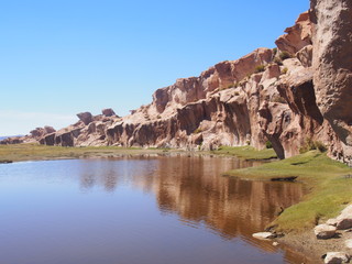 Fototapeta na wymiar Laguna Misteriosa, Mysterious lake in the midst of beautiful sky and nature, Journey from San Pedro de Atacama in Chile to Uyuni in Bolivia
